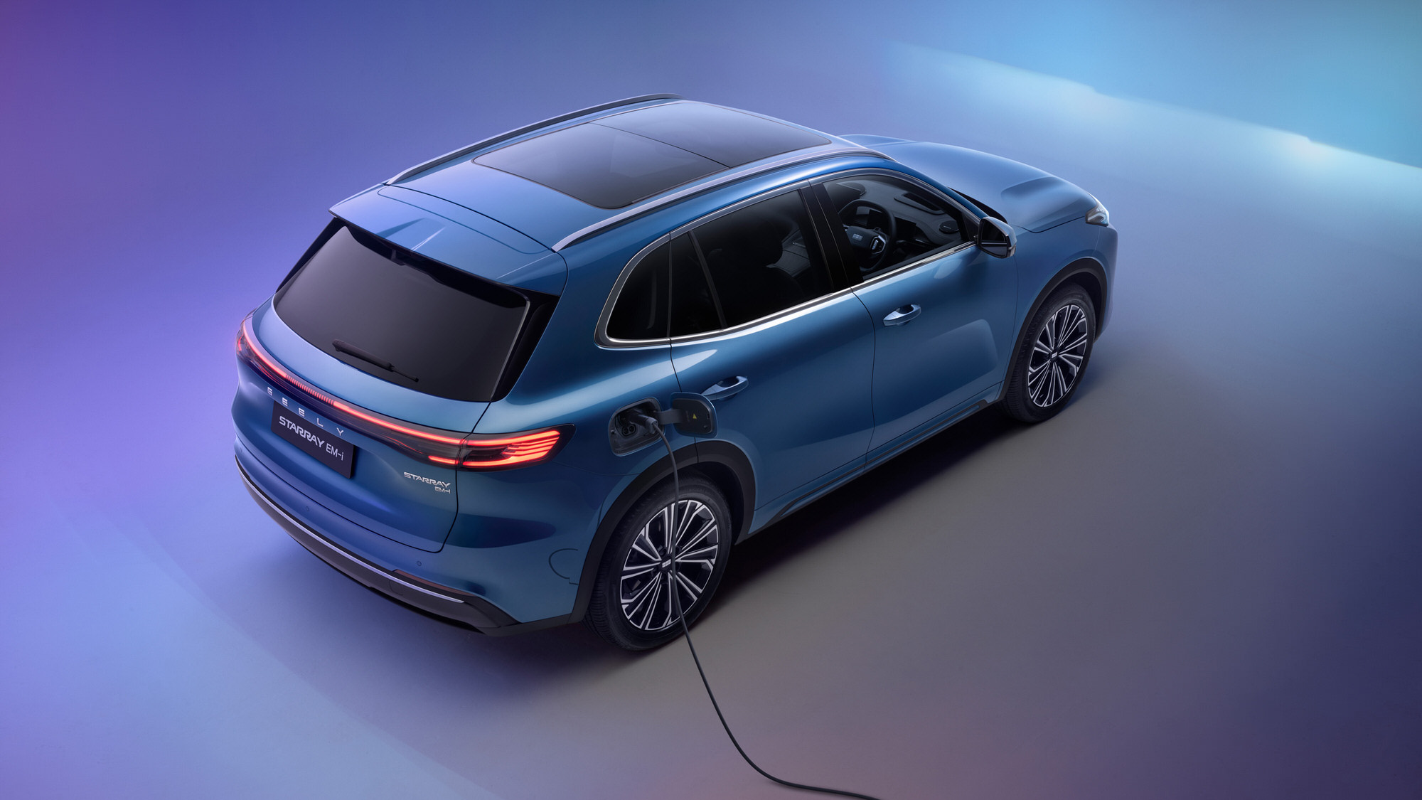 Geely vehicle shown from the rear in a studio setting